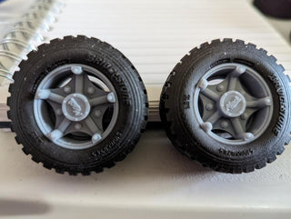 GARAGE SALE      24.5"  Float Tires w/ 5 spoke MACK wheels         1 Pair