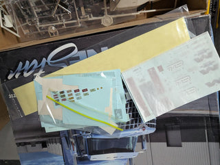 GARAGE SALE   Box of spare parts , decals, tires , wheels etc